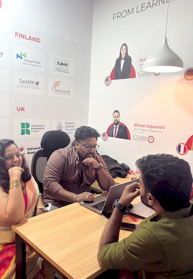 upGrad Rajkot office - student and parents with the counselling team after their study abroad session